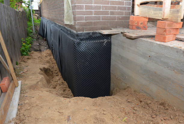 Happy homeowners after waterproofing job in Philadelphia